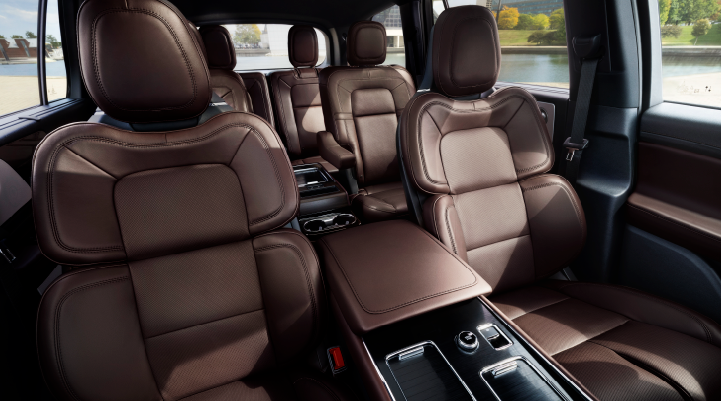 The cabin of the 2025 Lincoln Aviator® SUV is shown with black and brown accents. | Friendly Lincoln in Monroe MI