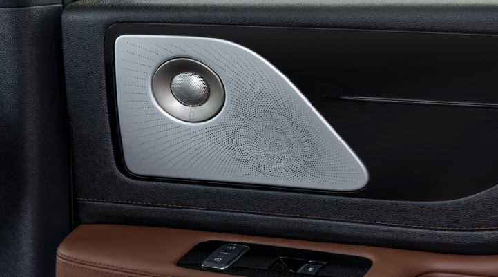 A close-up of a speaker located on the door’s interior is shown. | Friendly Lincoln in Monroe MI