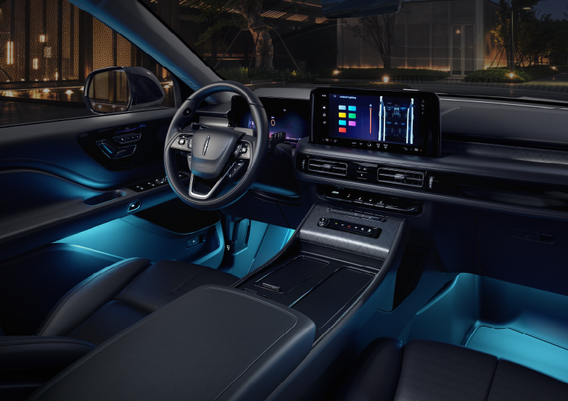 Deep blue ambient lighting glows from various places within a 2025 Lincoln Aviator® SUV. | Friendly Lincoln in Monroe MI
