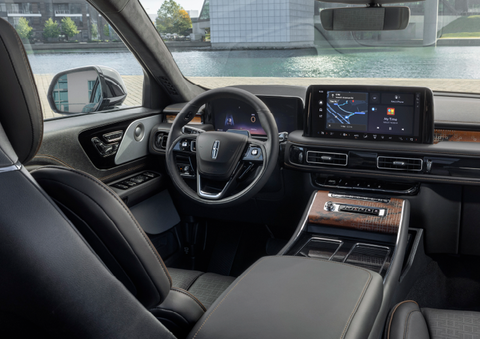 The interior of the 2025 Lincoln Aviator® SUV is shown parked with a view of a harbor through the windshield. | Friendly Lincoln in Monroe MI