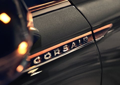 The stylish chrome badge reading “CORSAIR” is shown on the exterior of the vehicle. | Friendly Lincoln in Monroe MI