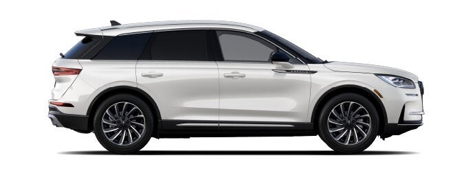 The passenger side of a Lincoln Corsair® SUV is shown in the Ceramic Pearl extra-cost exterior paint option. | Friendly Lincoln in Monroe MI
