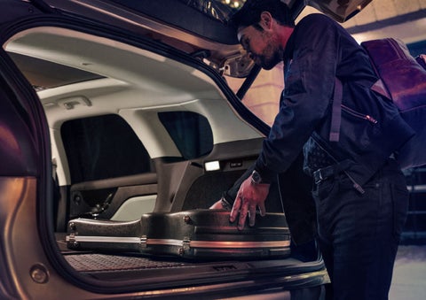 The driver of a 2024 Lincoln Corsair® SUV is shown selecting the drive mode. | Friendly Lincoln in Monroe MI