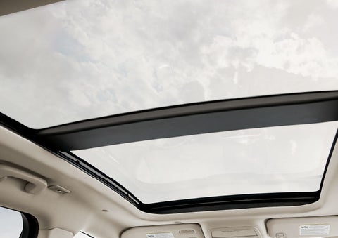 The driver of a 2024 Lincoln Corsair® SUV is shown selecting the drive mode. | Friendly Lincoln in Monroe MI