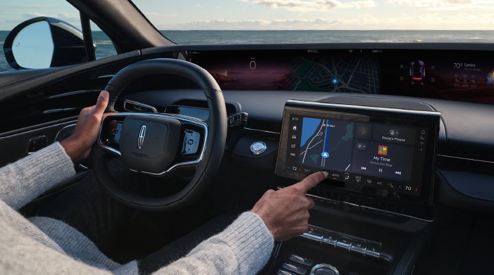 The driver of a 2025 Lincoln Nautilus® SUV interacts with the new Lincoln Digital Experience. | Friendly Lincoln in Monroe MI