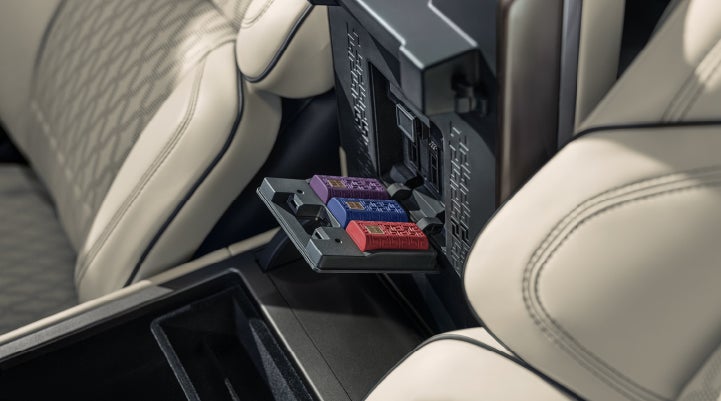 Digital Scent cartridges are shown in the diffuser located in the center arm rest. | Friendly Lincoln in Monroe MI