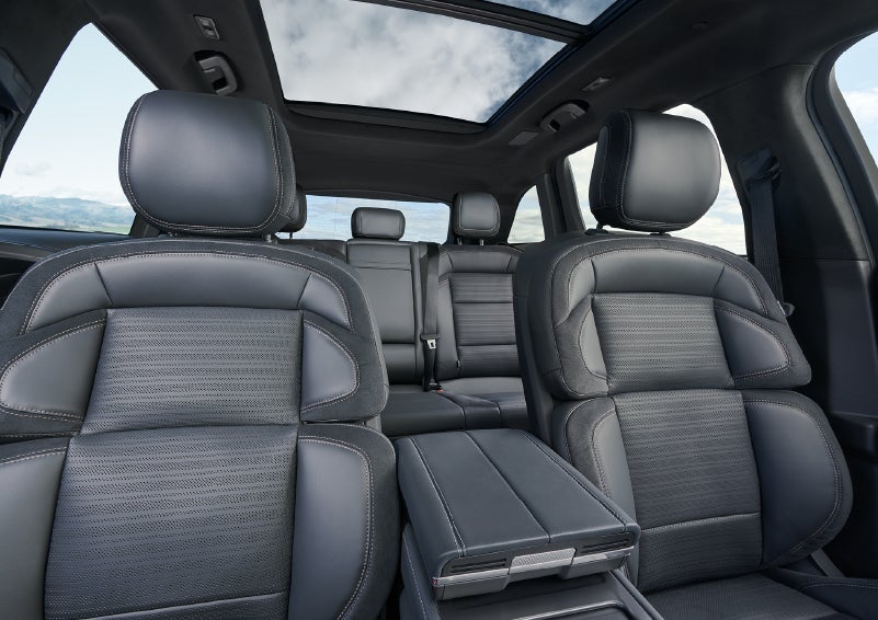 The spacious second row and available panoramic Vista Roof® is shown. | Friendly Lincoln in Monroe MI