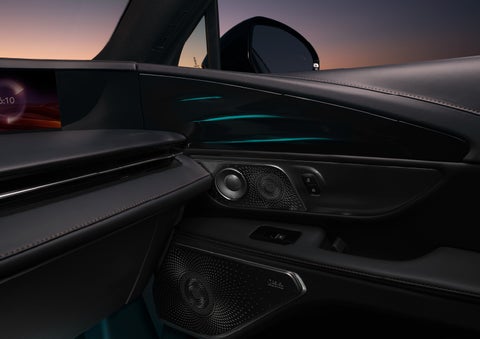 Selectable ambient lighting glows in the passenger door panel. | Friendly Lincoln in Monroe MI