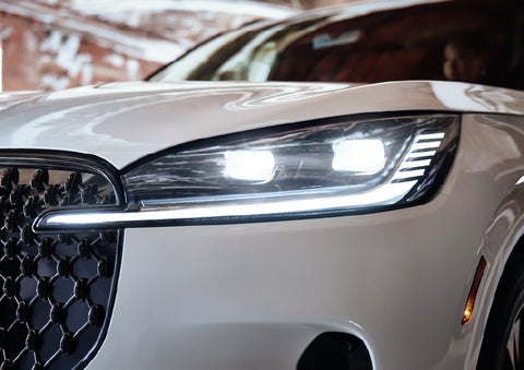 A close-up of a headlamp on the 2026 Lincoln Aviator® SUV is shown | Friendly Lincoln in Monroe MI
