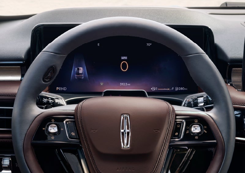The driver’s information cluster display behind the steering wheel is shown. | Friendly Lincoln in Monroe MI