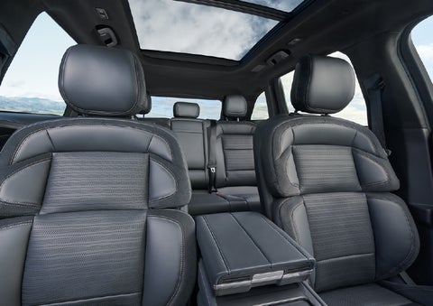 The spacious second row and available panoramic Vista Roof® is shown. | Friendly Lincoln in Monroe MI