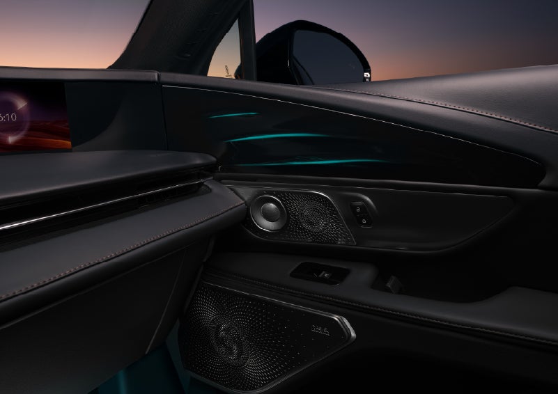 Selectable ambient lighting glows in the passenger door panel. | Friendly Lincoln in Monroe MI