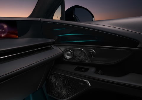 Selectable ambient lighting glows in the passenger door panel. | Friendly Lincoln in Monroe MI