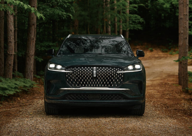 The front grille of a 2027 Lincoln Aviator® Black Label™ SUV is shown. | Friendly Lincoln in Monroe MI