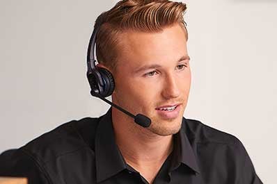 A photo of a Lincoln employee working at the Lincoln Client Relationship Center